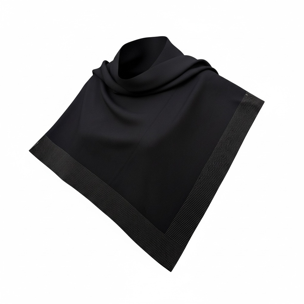 Black poncho with rhinestone embellished border.